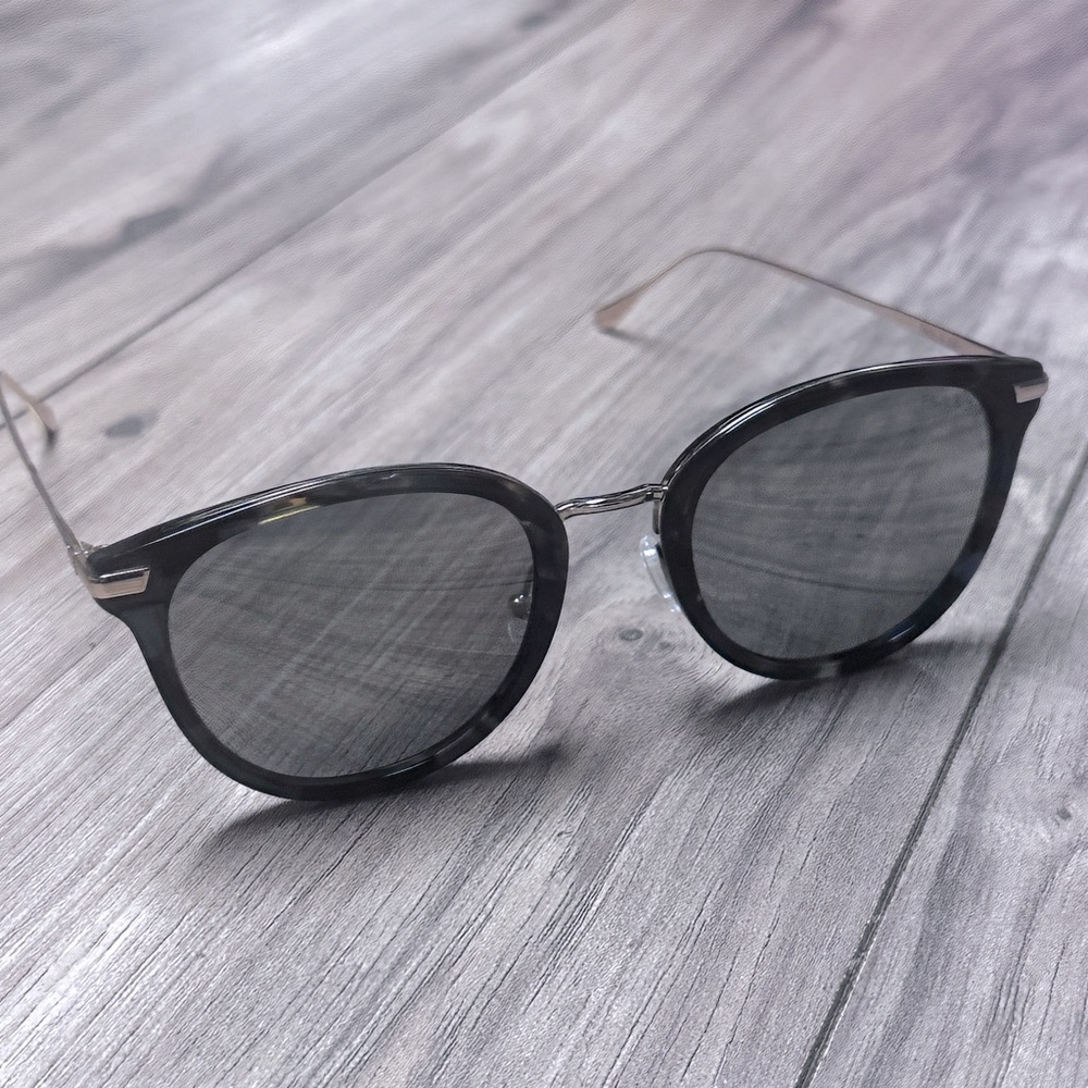 Paul & Joe Elegant Black specked Sunglasses. In good condition!